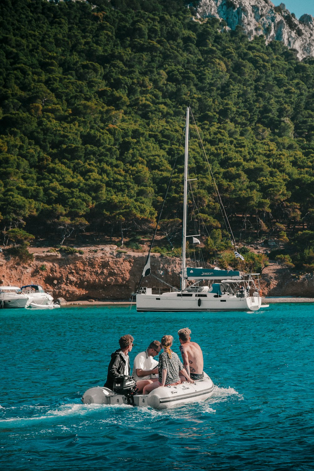 a group of people swimming in a body of water