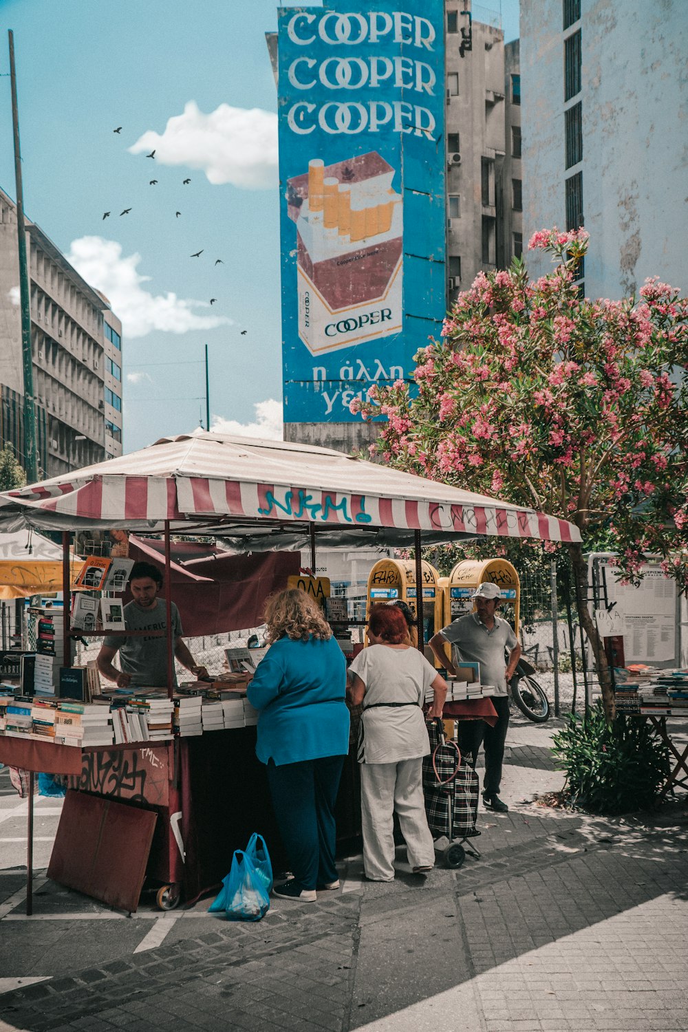 a group of people walking down a street