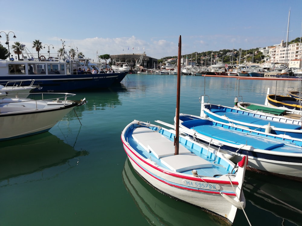 a group of boats that are sitting in the water