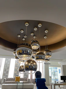 Luxurious modern living room sparkling clean with diamond-shaped light reflections.