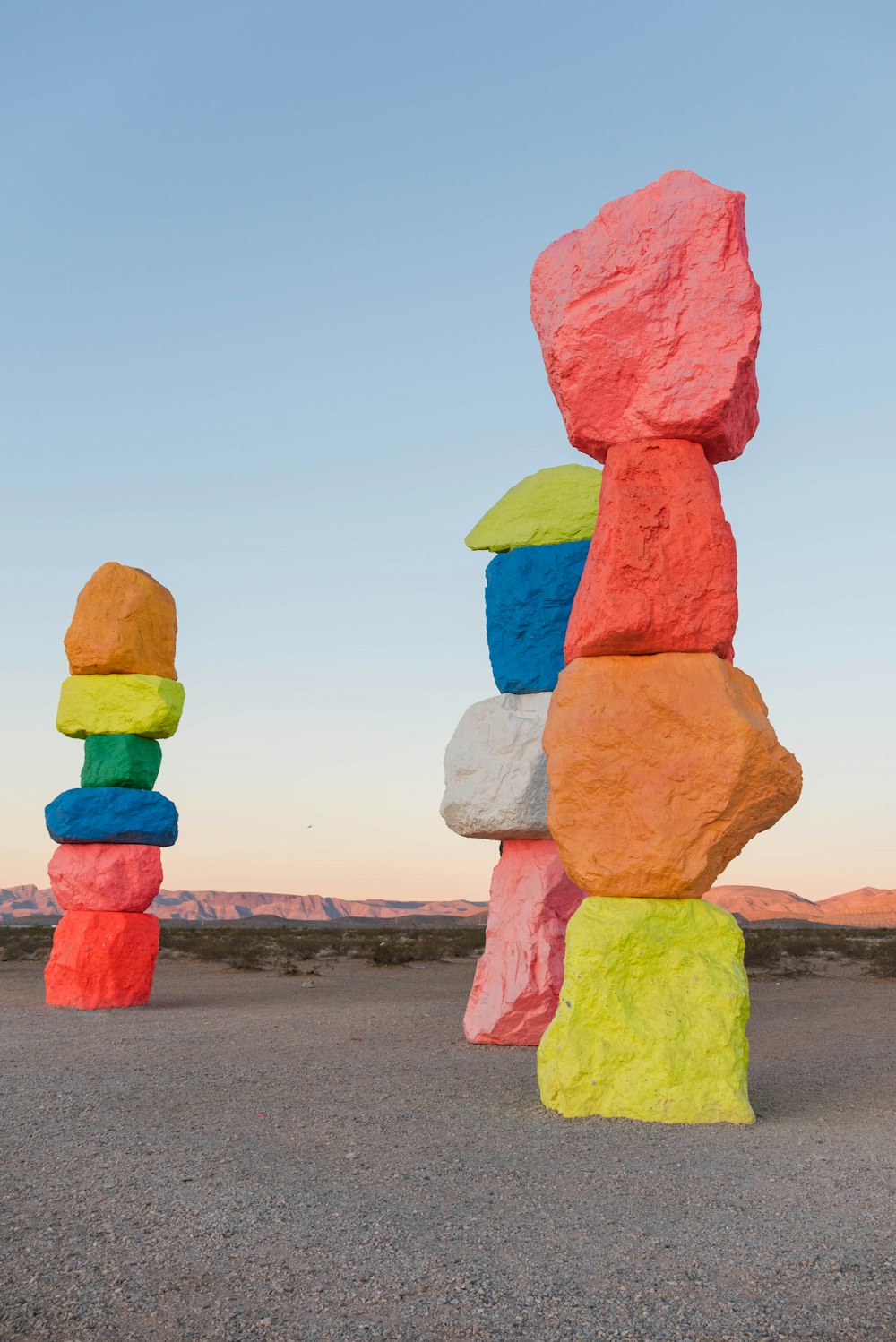 a stack of rocks sitting in the middle of a desert