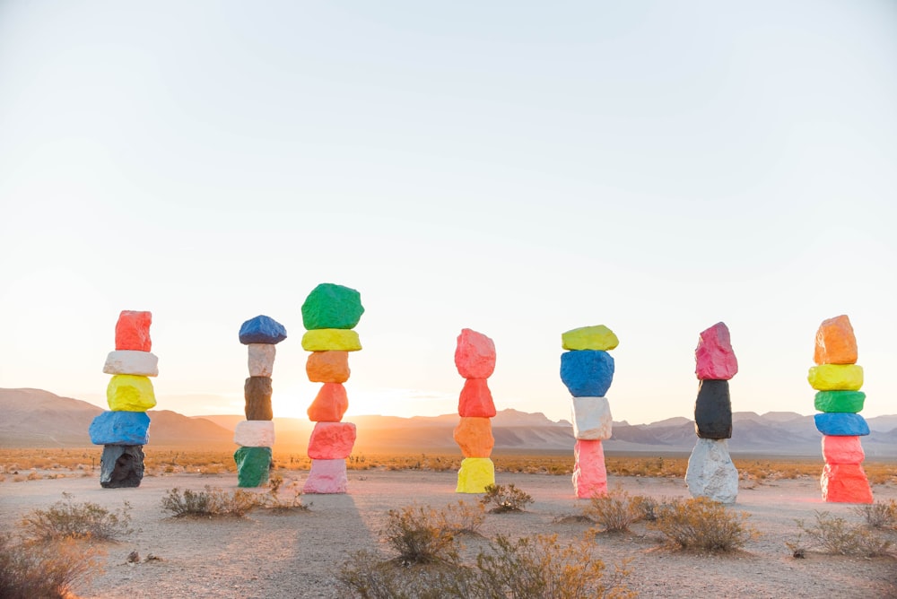 a number of different colored blocks in the desert