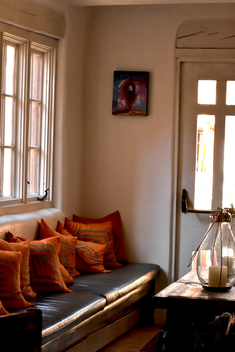 a living room filled with furniture and a window