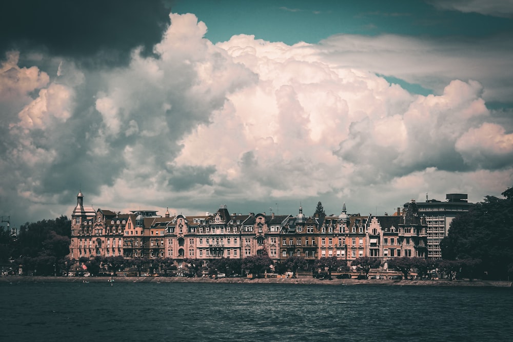 a large building sitting on top of a body of water