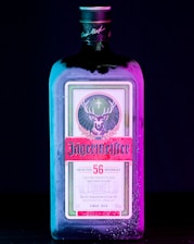 a bottle of liquor sitting on top of a table