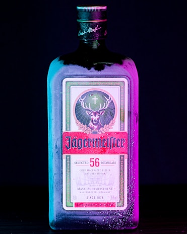 a bottle of liquor sitting on top of a table