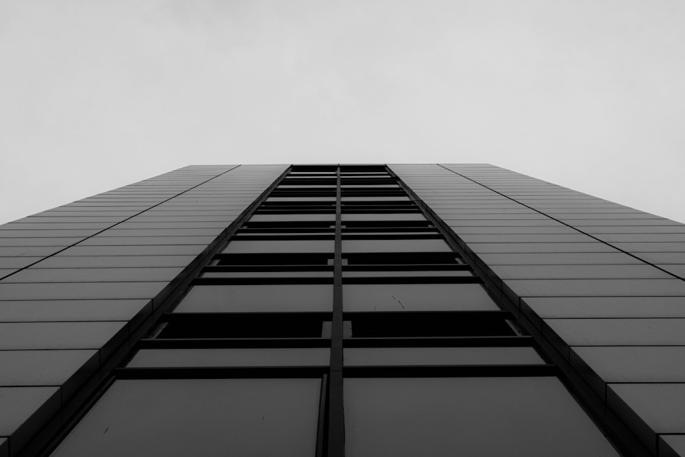 a black and white photo of a tall building