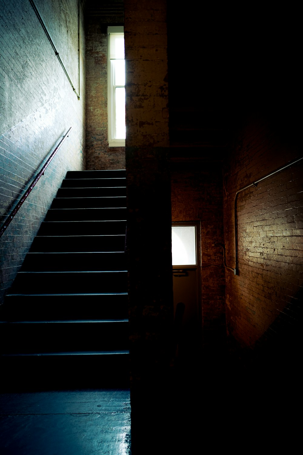 a set of stairs leading up to a window