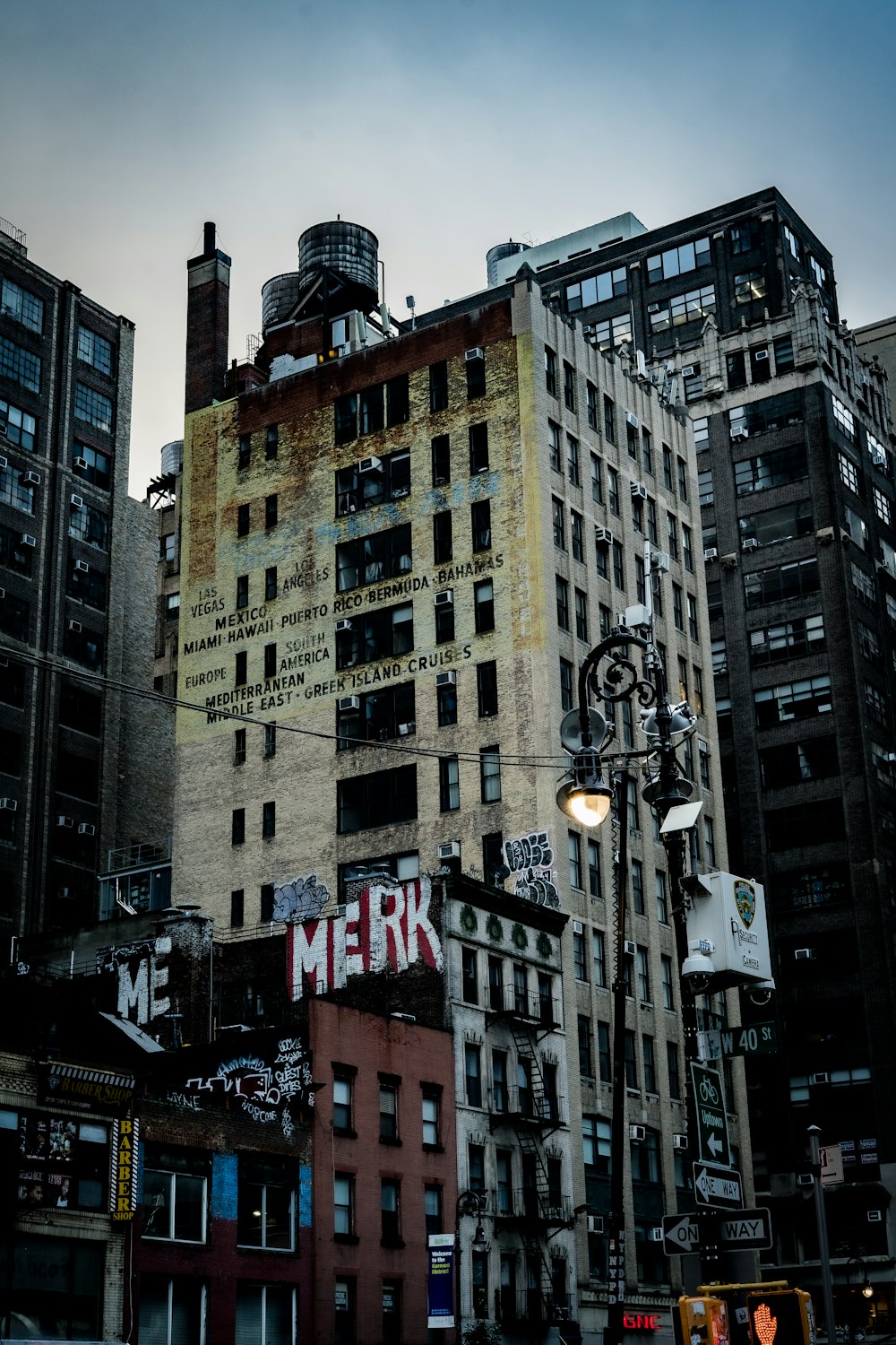 a very tall building with a very large sign on it's side