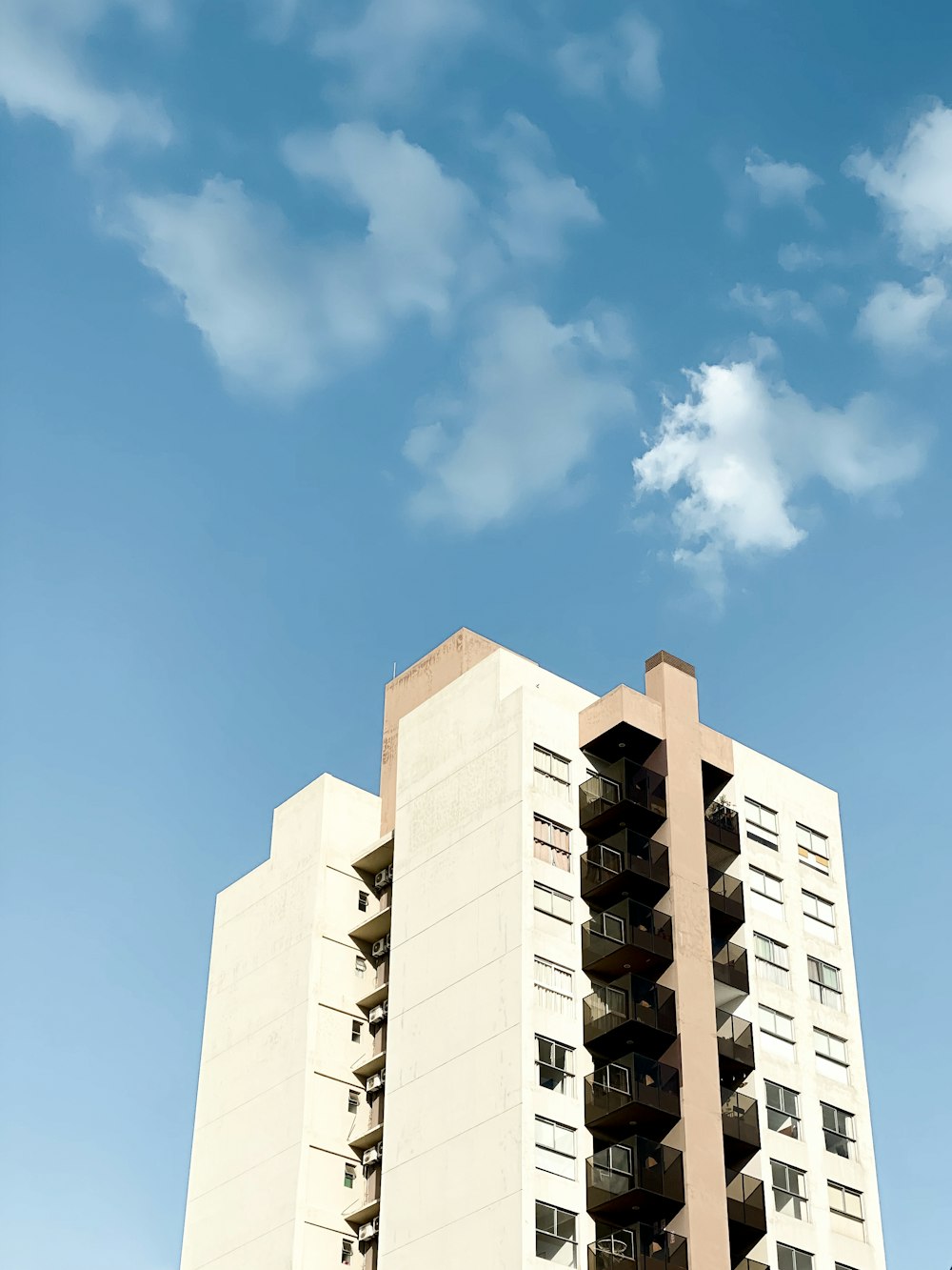 a tall building with balconies and balconies on it