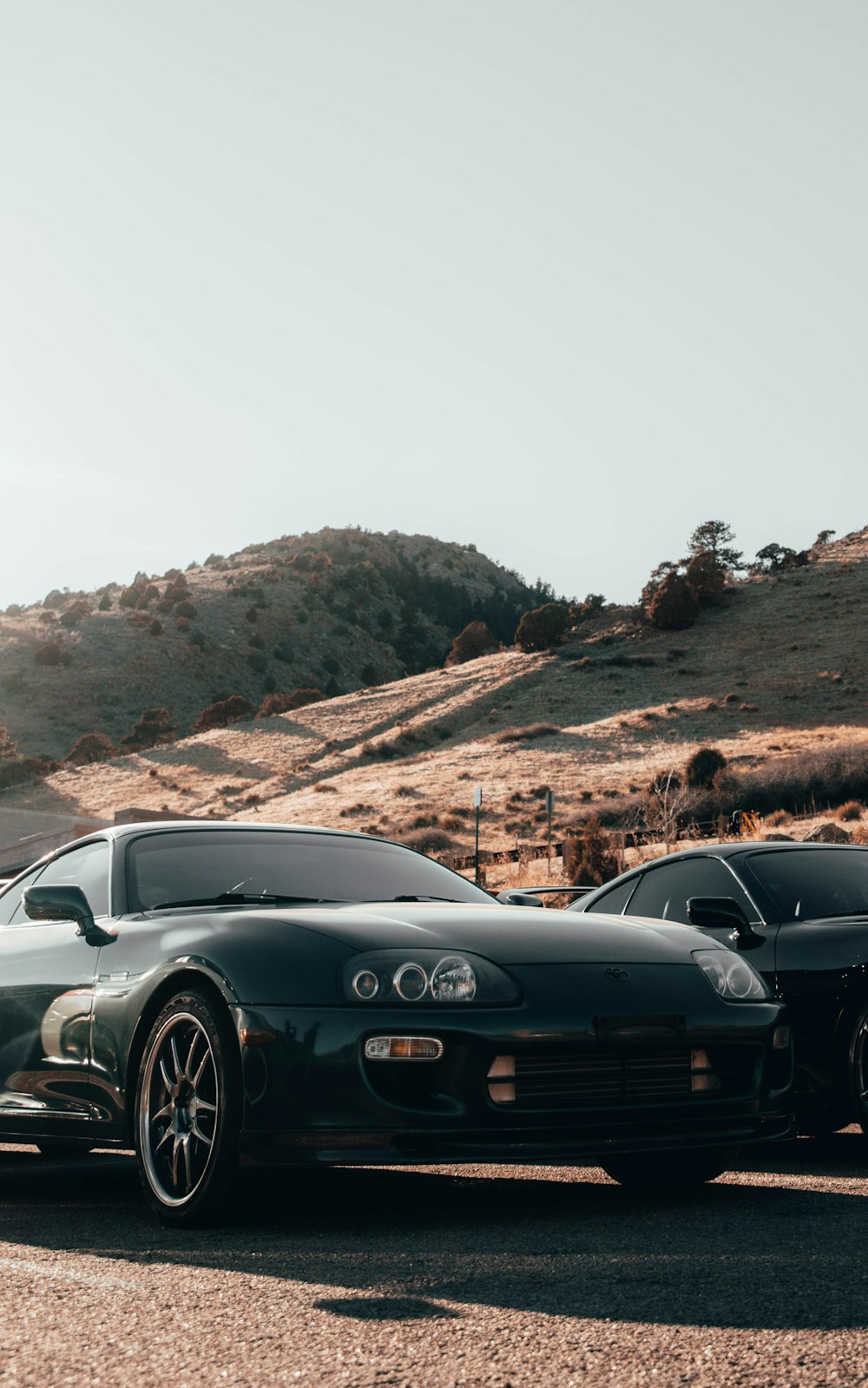 a couple of cars parked next to each other