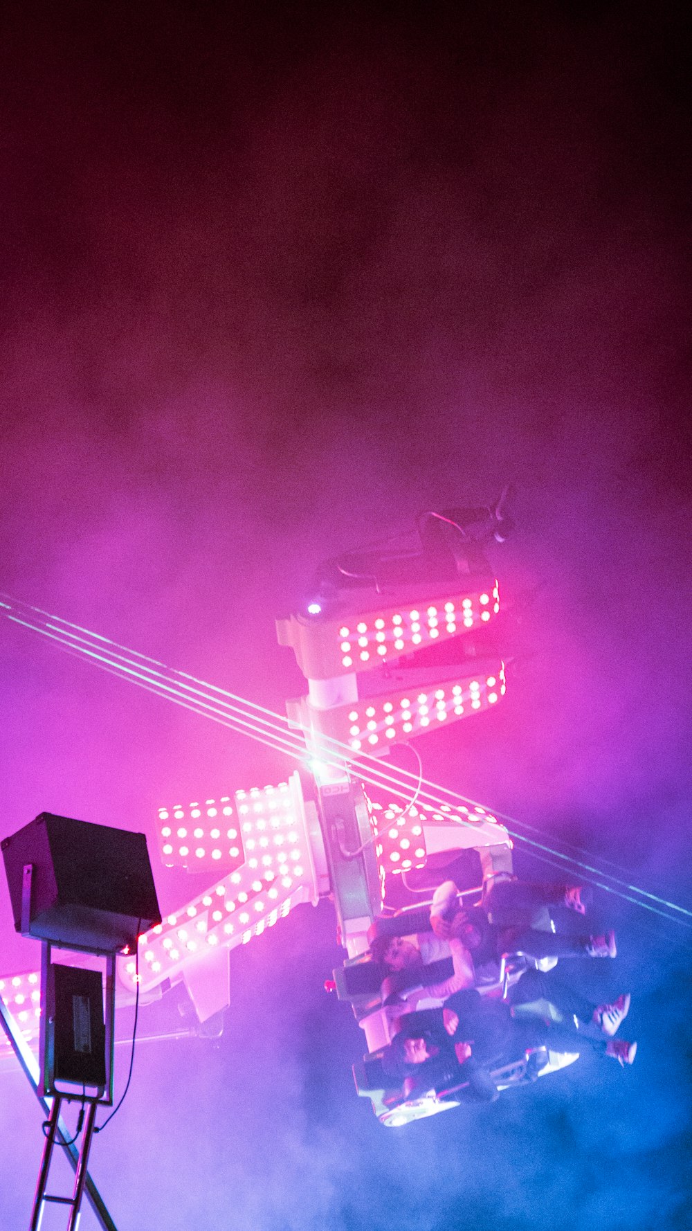 a group of people standing on top of a stage