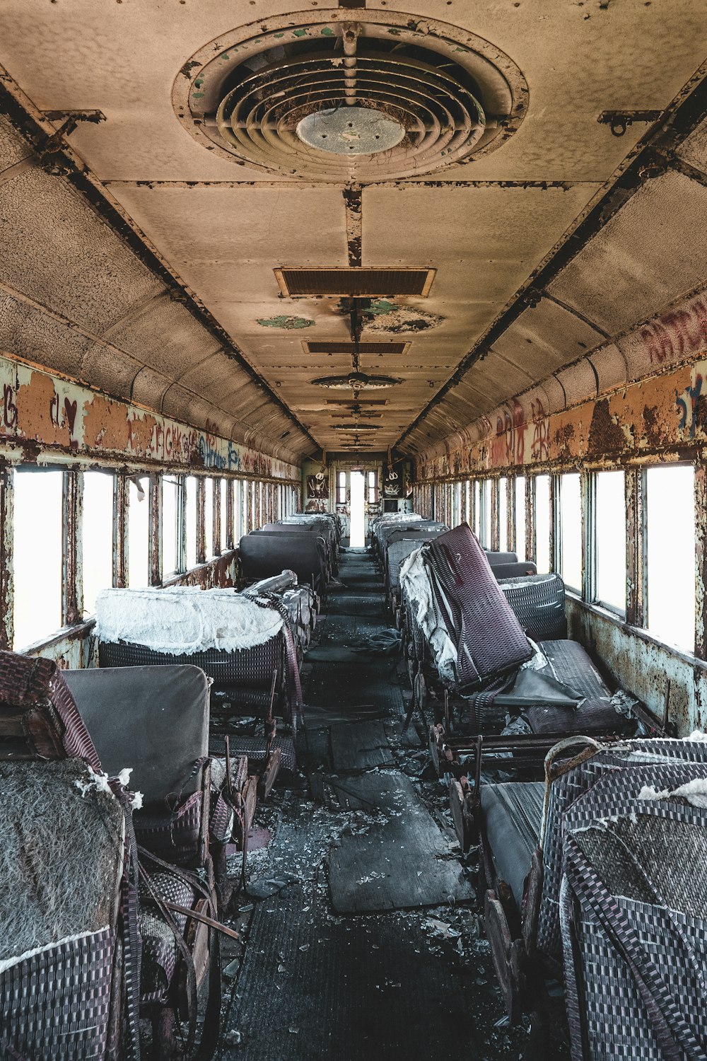 a bunch of seats that are inside of a bus