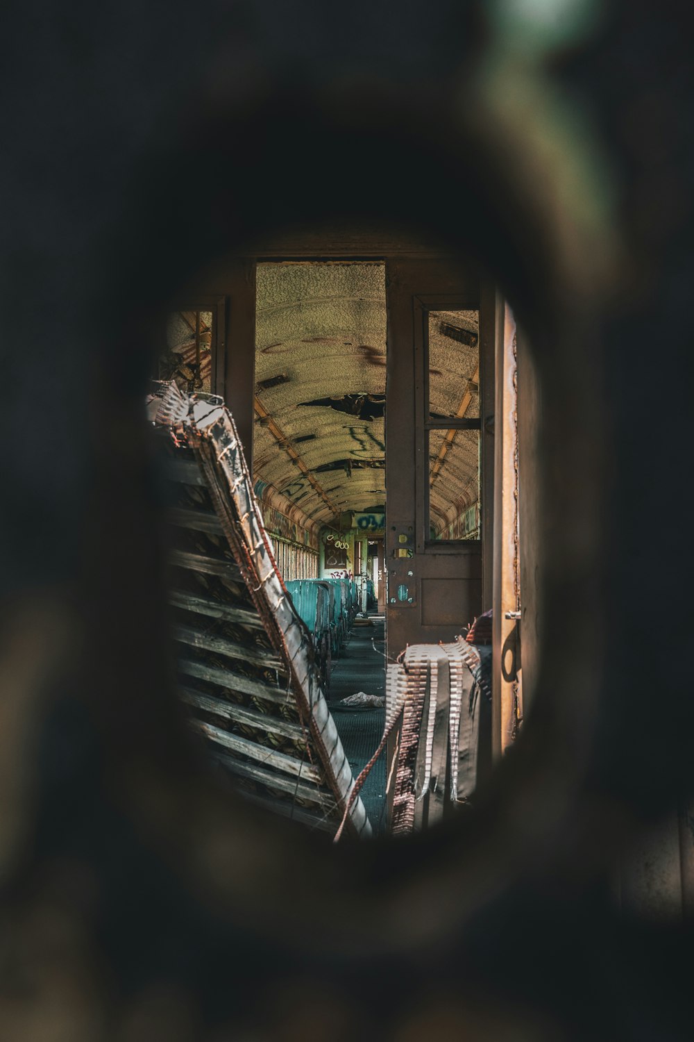 a reflection of a stair case in a mirror