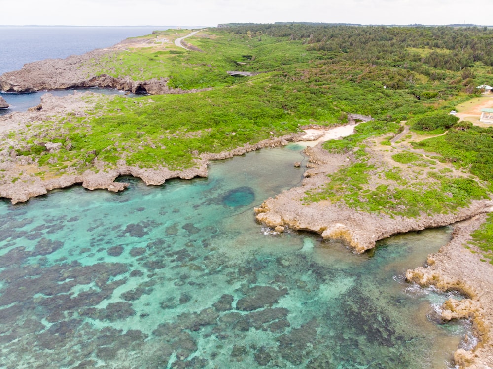 an aerial view of the ocean and land