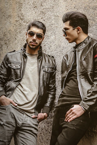 a couple of men standing next to each other