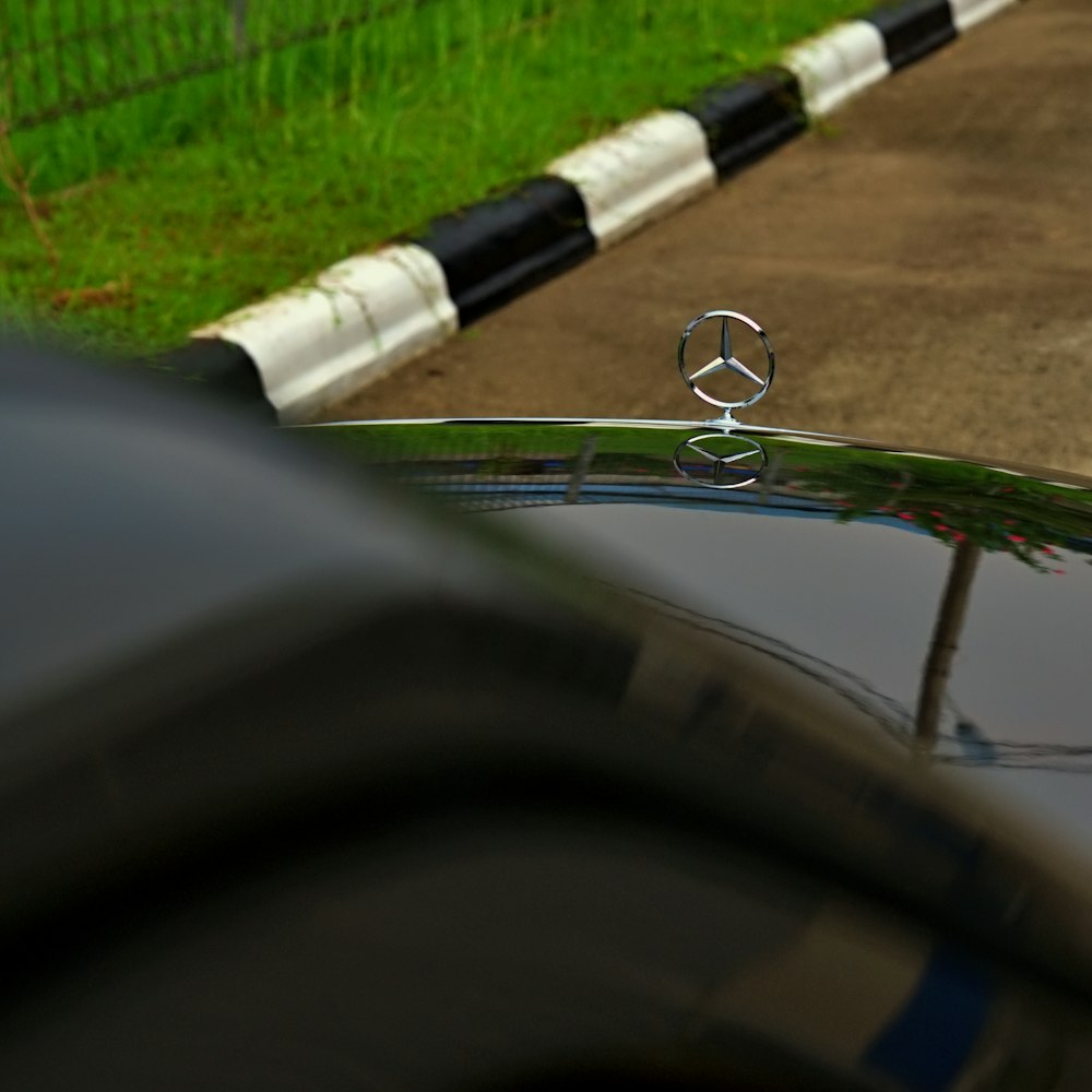 a mercedes emblem on the hood of a car