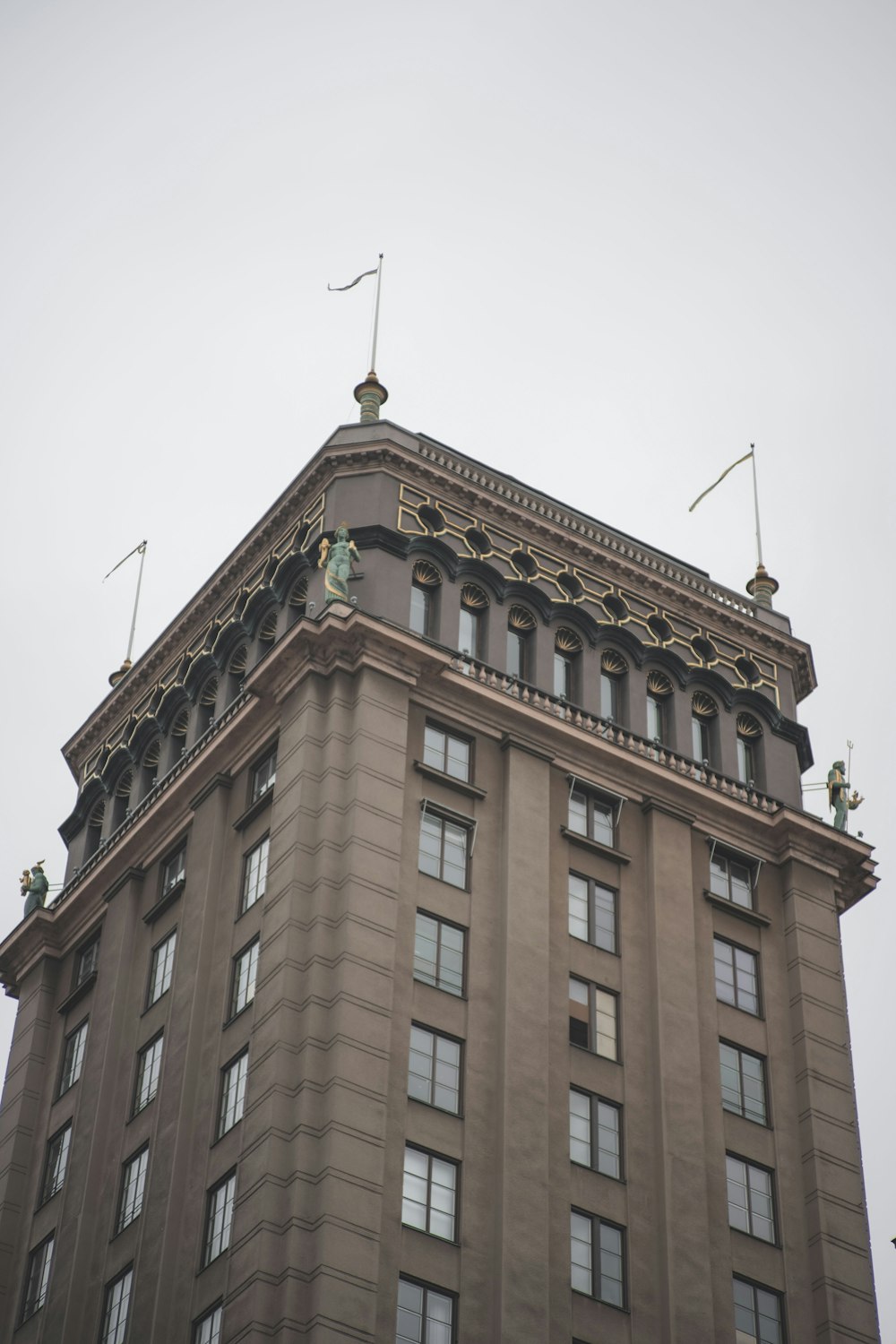 a tall building with a clock on the top of it