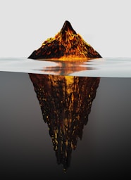 a mountain is reflected in the water
