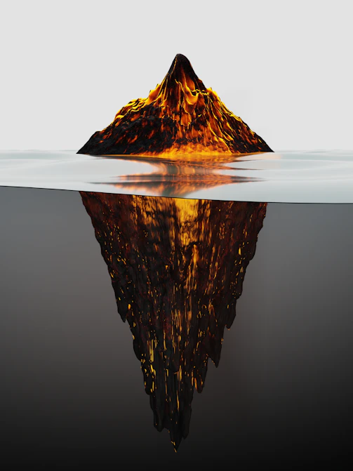 a mountain is reflected in the water