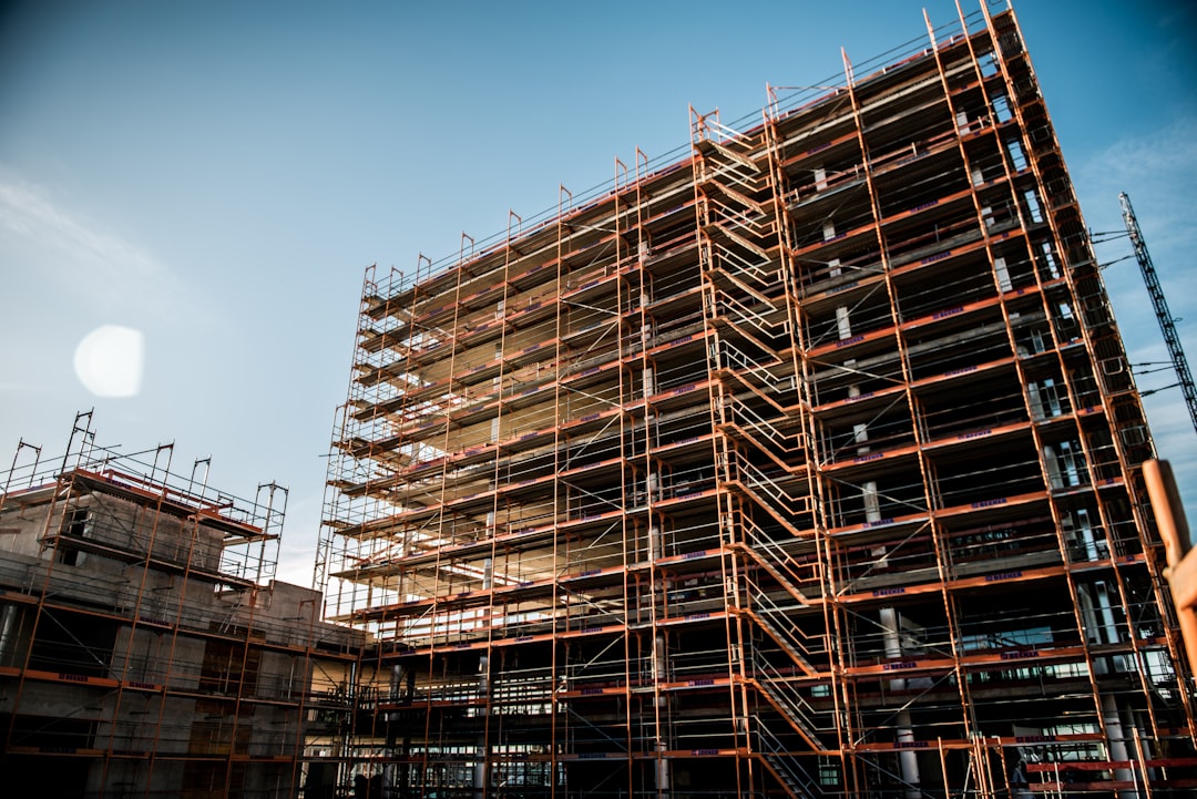 a very tall building with lots of scaffolding around it,