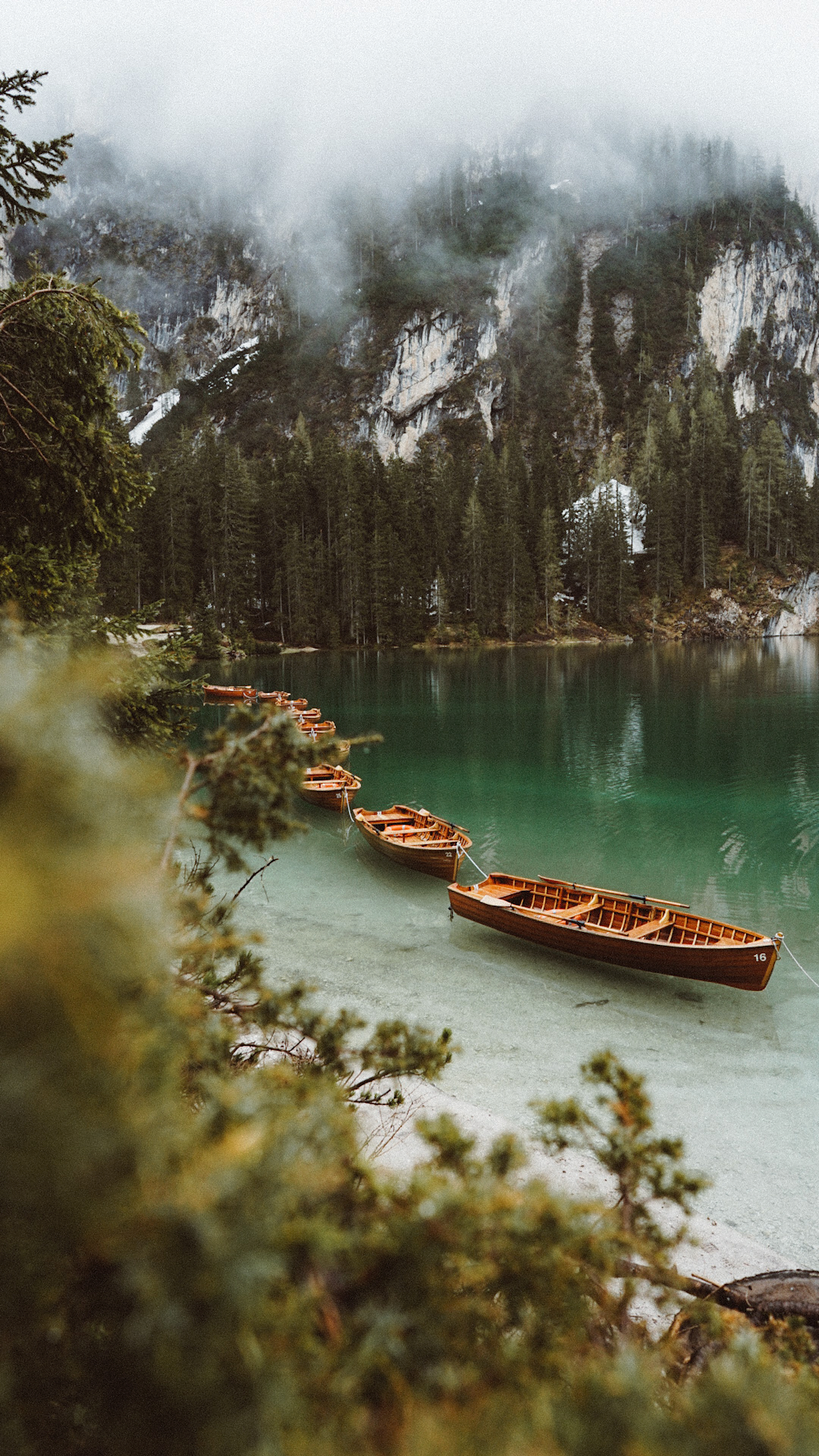 a couple of boats that are sitting in the water