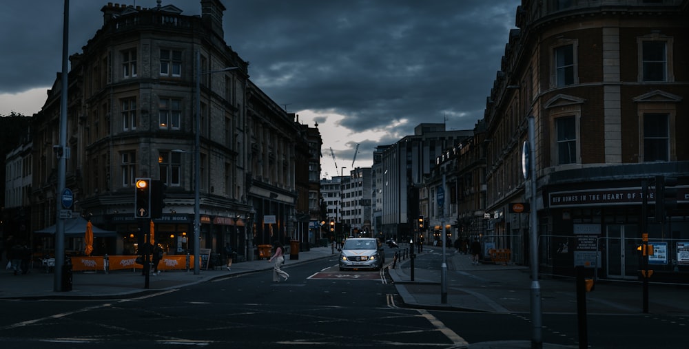 a bus is driving down a city street