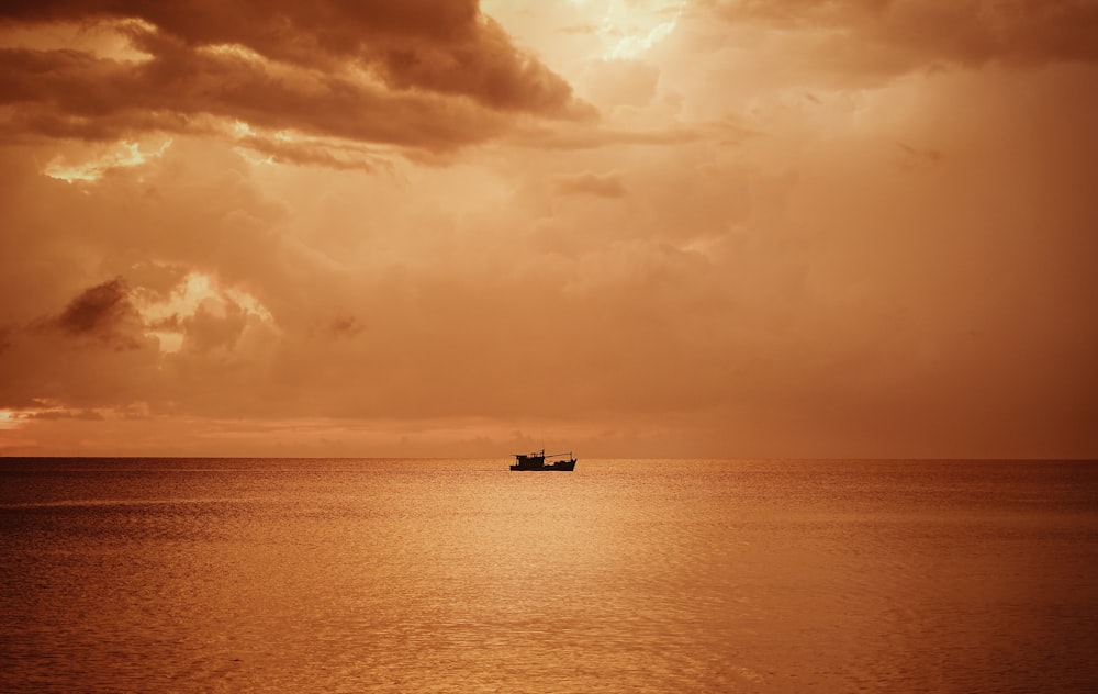 a large boat floating on top of a large body of water