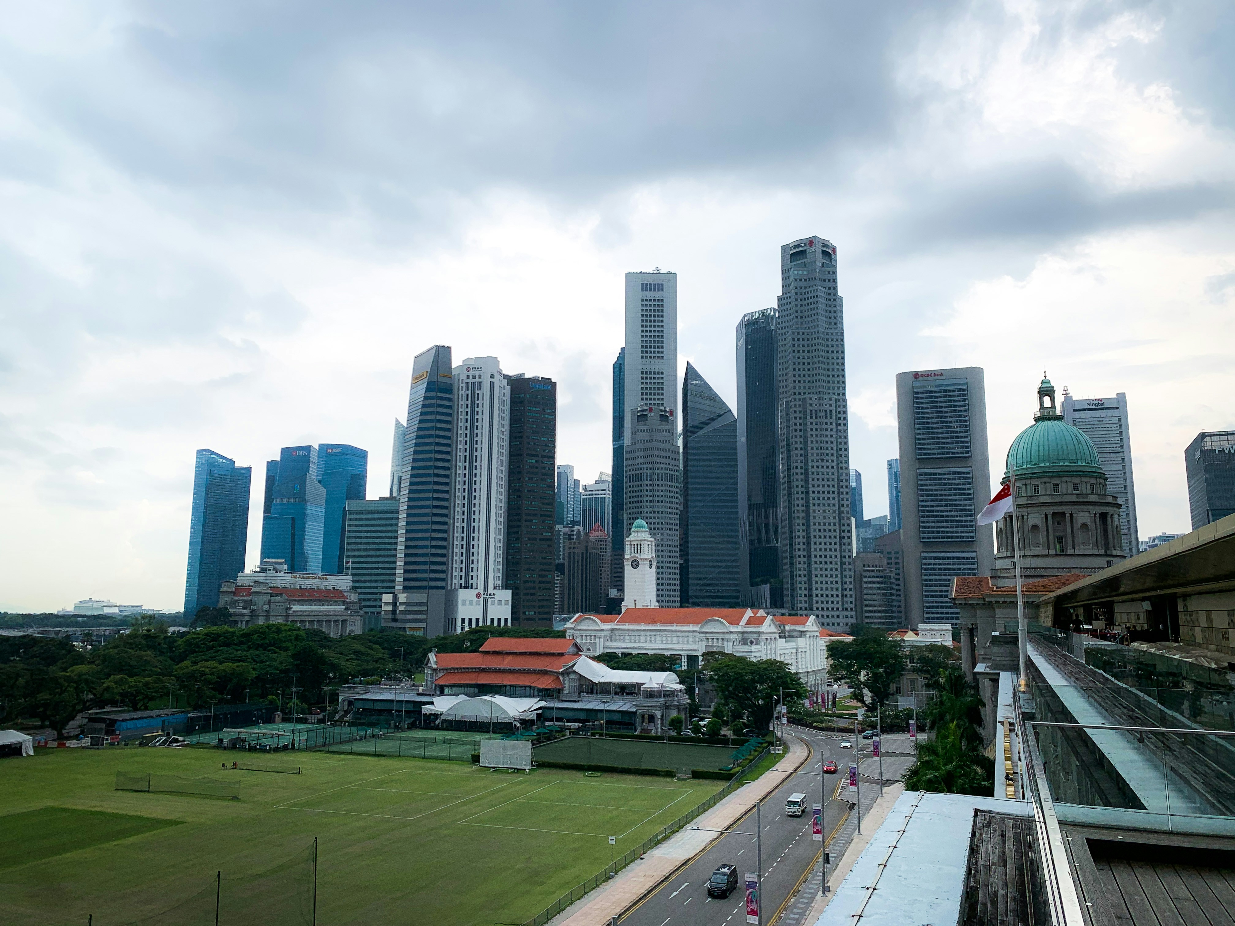a view of a city with tall buildings in the background