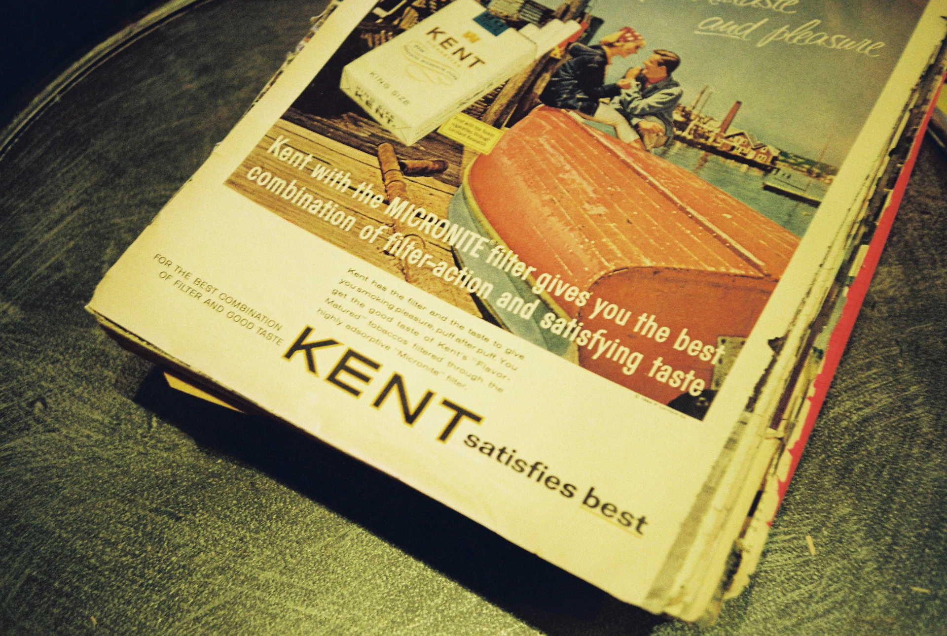 a magazine sitting on top of a wooden table