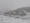 Family with children enjoying a safe and cozy transfer through snowy mountain roads.