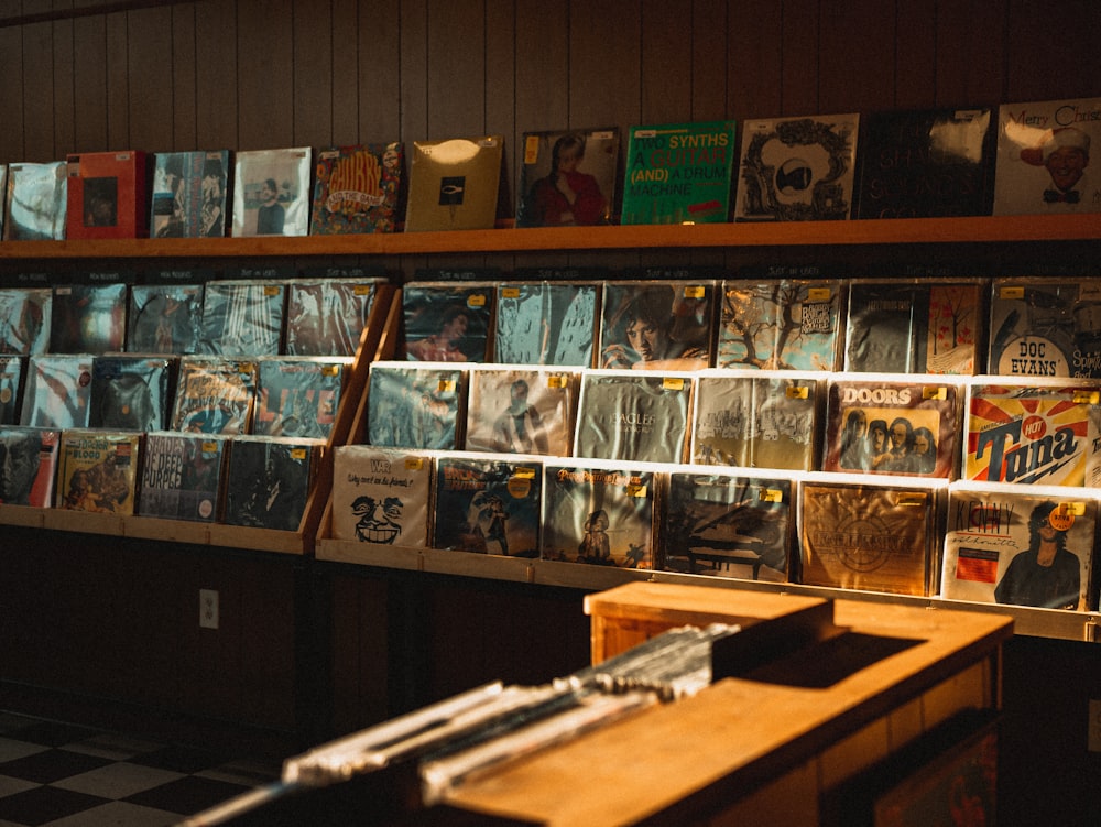 a room filled with lots of records on a shelf