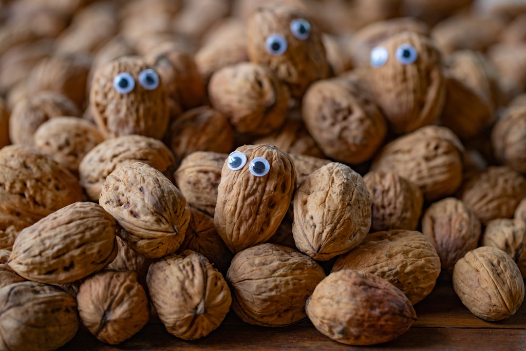 a pile of nuts with googly eyes on them