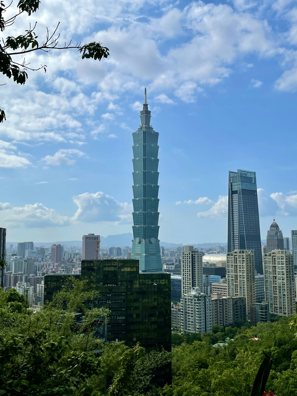 a view of a very tall building in a city