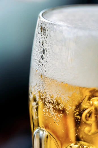 a close up of a glass of beer