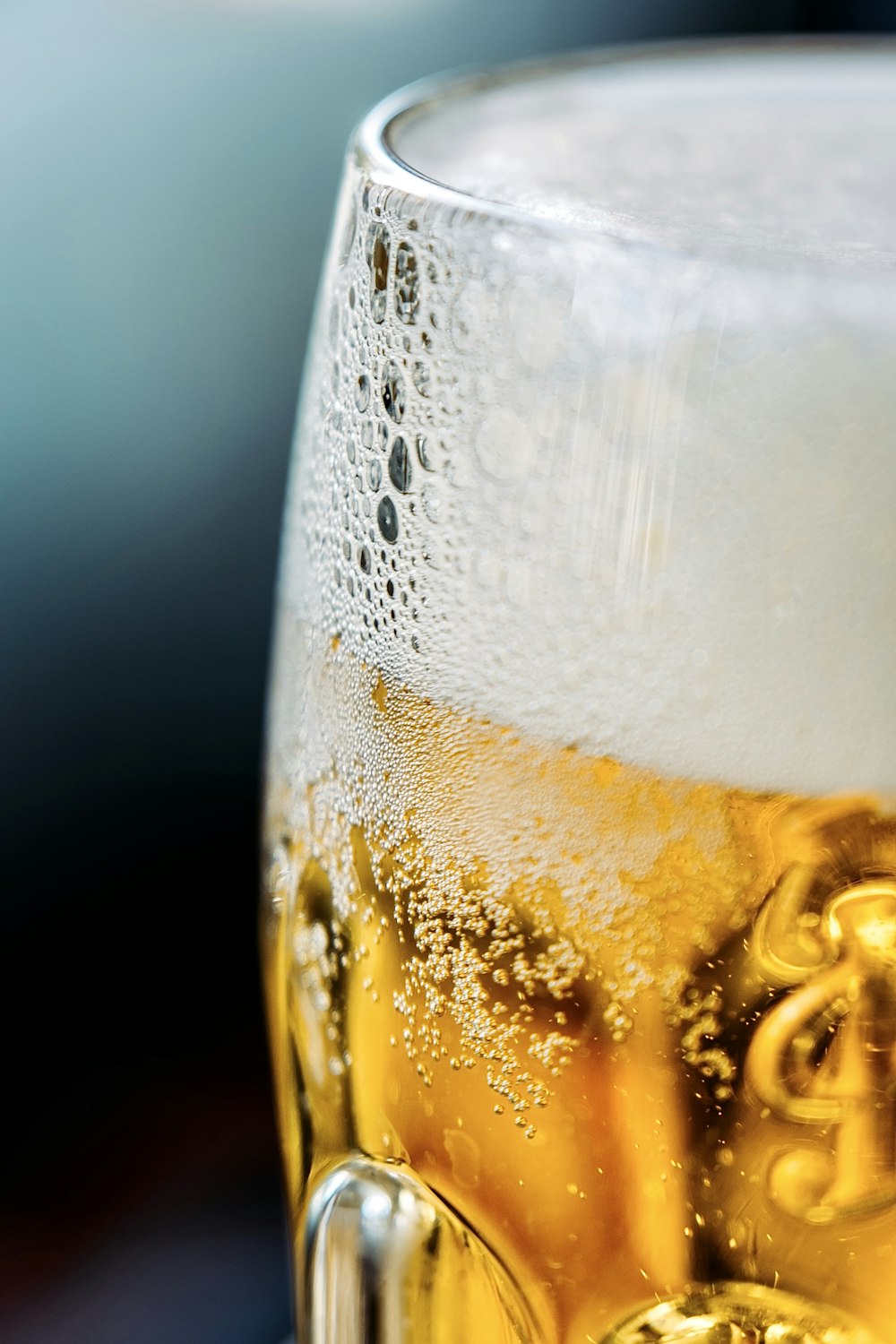 a close up of a glass of beer