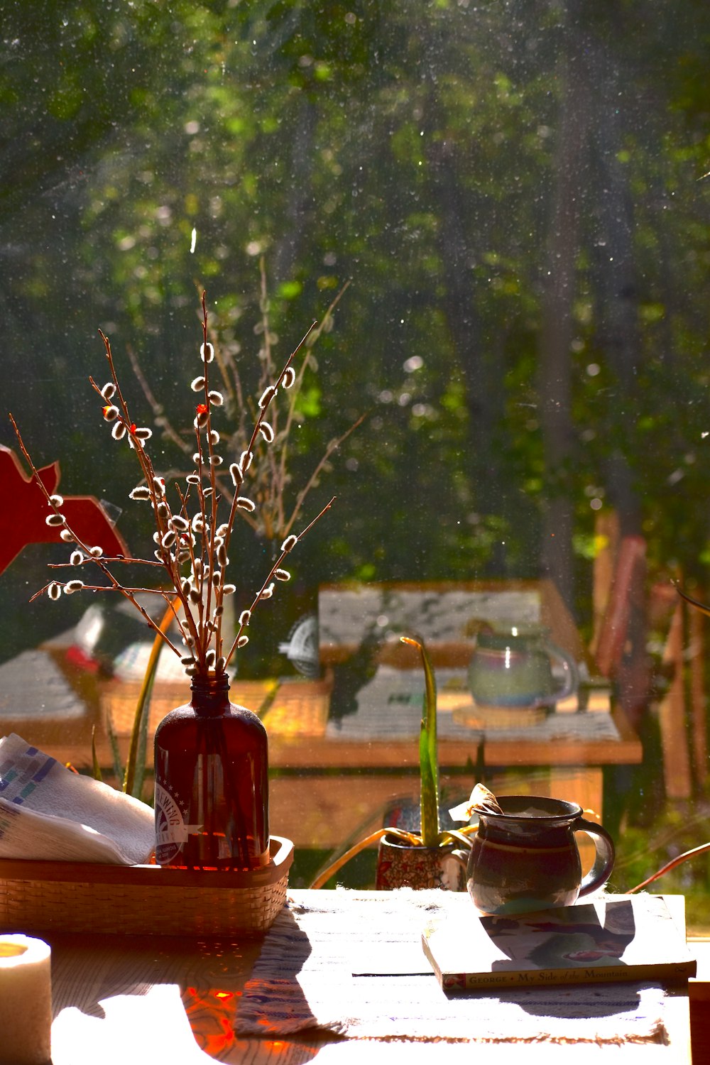 a table with a vase of flowers on it