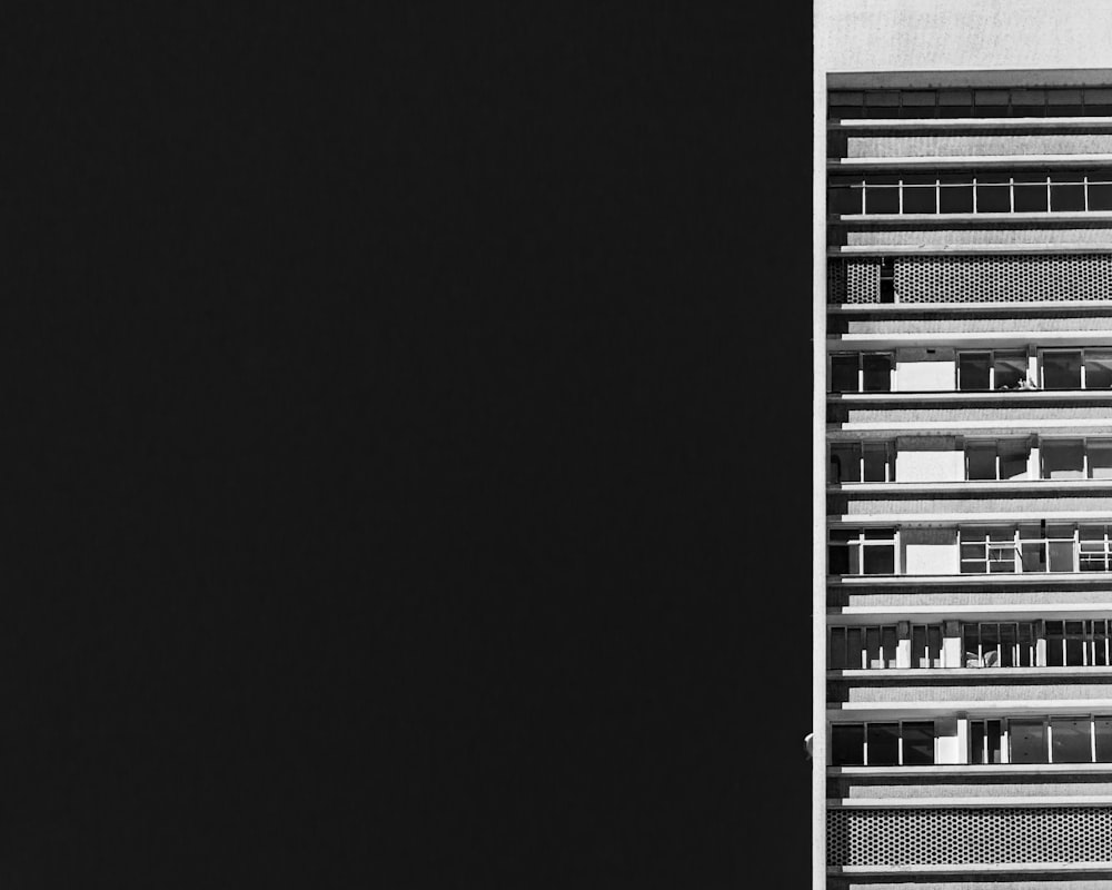 a black and white photo of a tall building