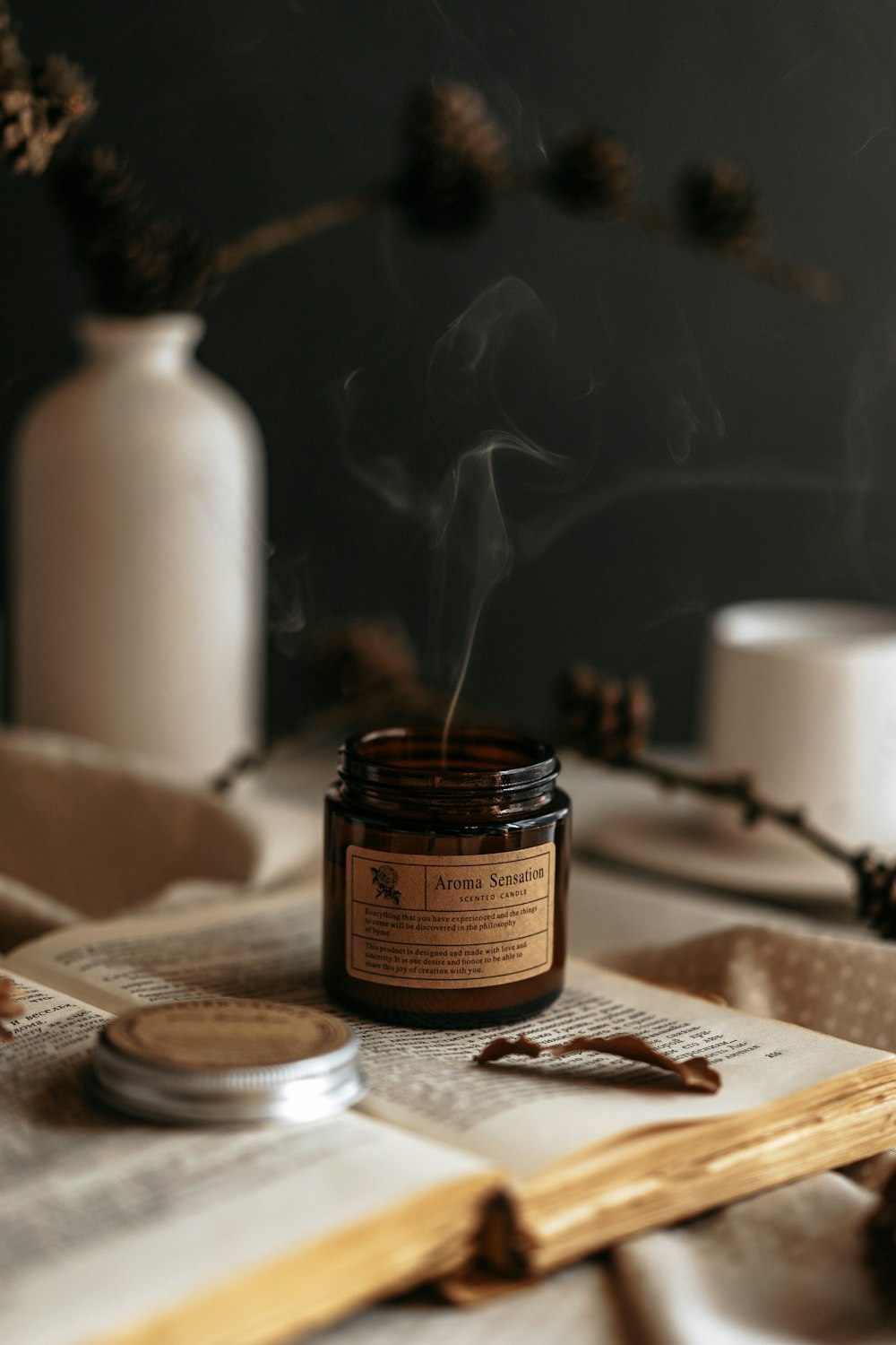 a candle sitting on top of a wooden table