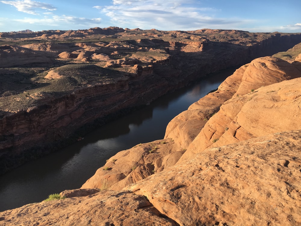 a view of a body of water in a canyon