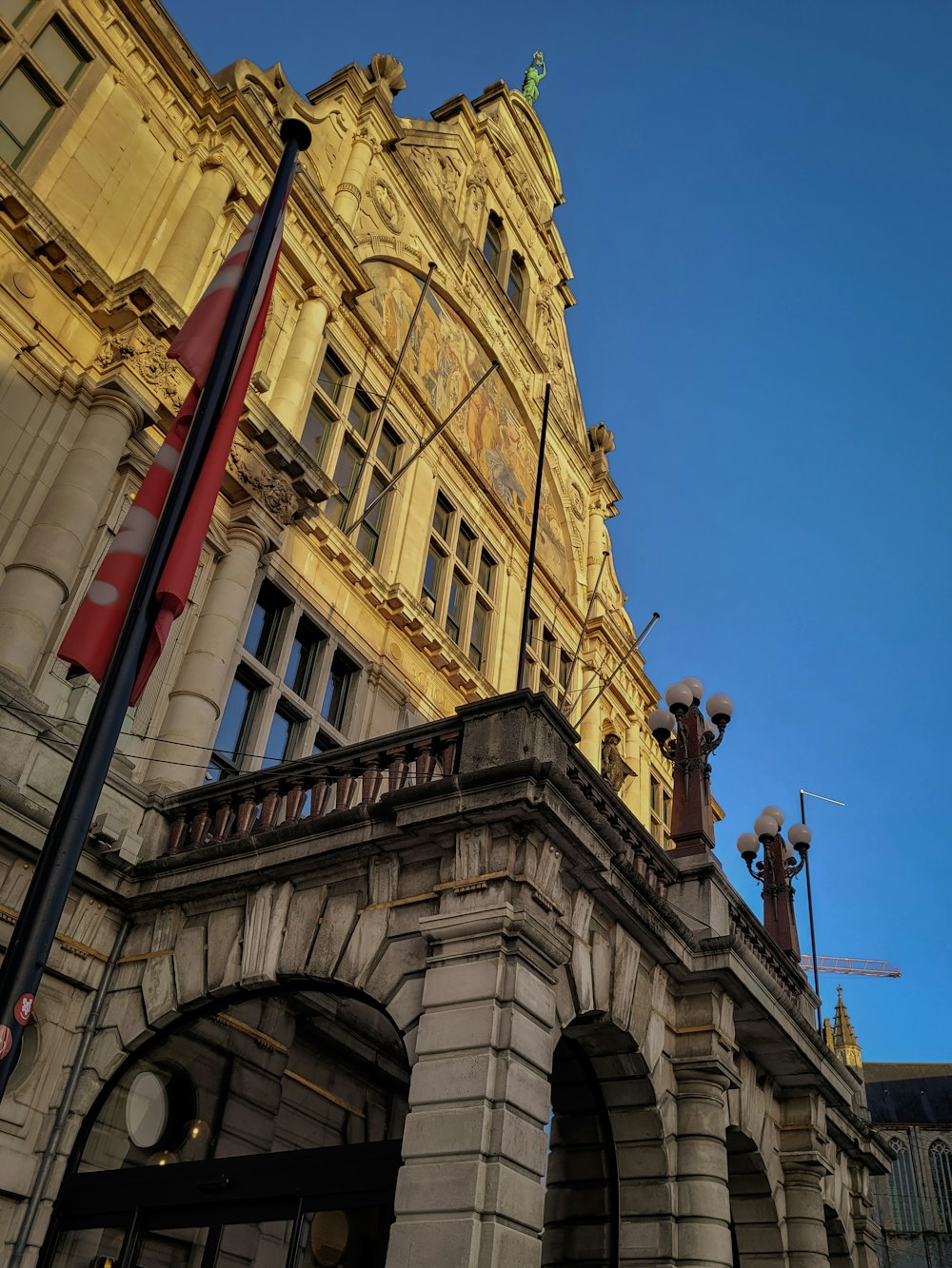 a tall building with a clock on the top of it