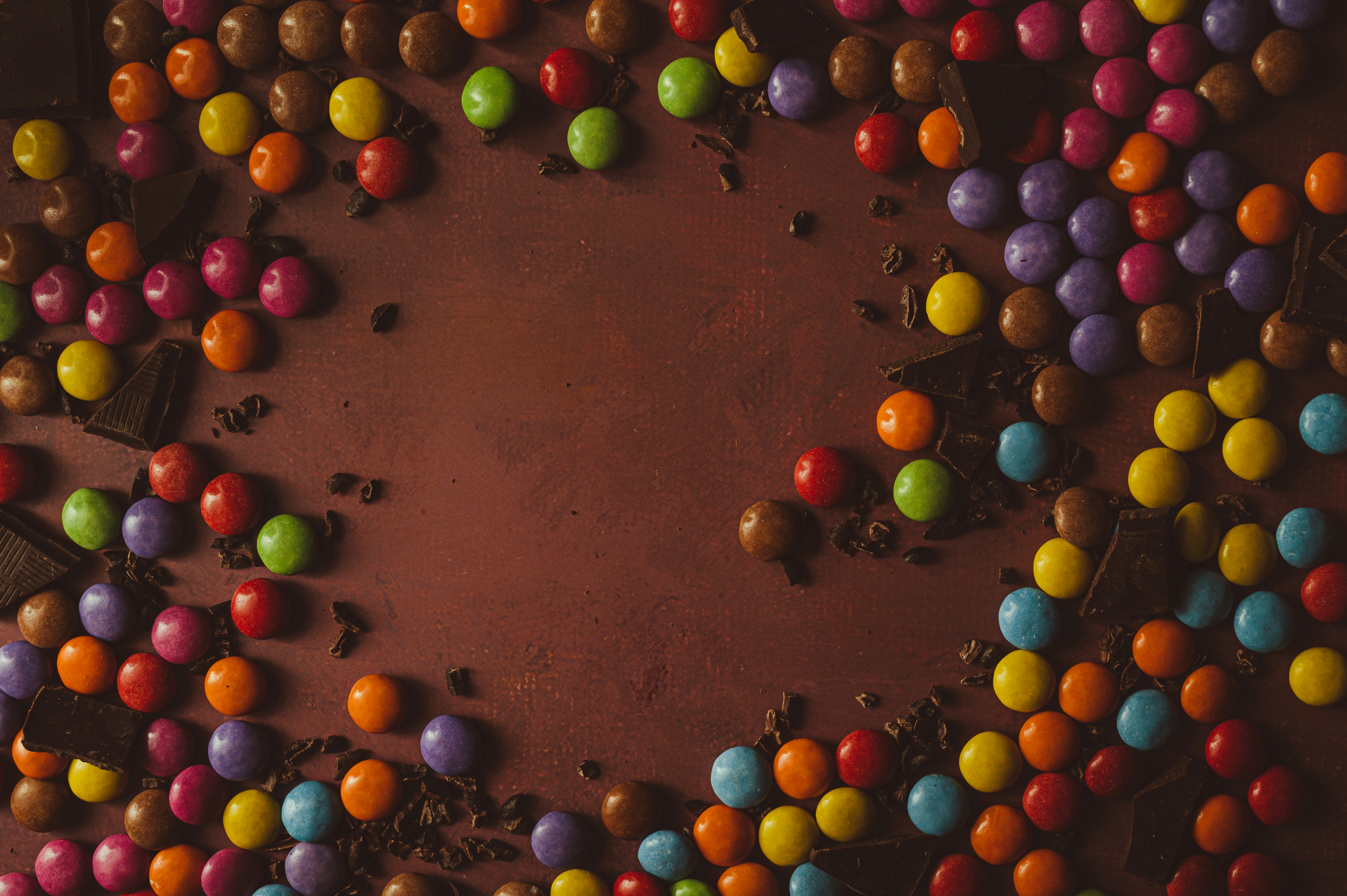 a chocolate cake topped with lots of colorful candies