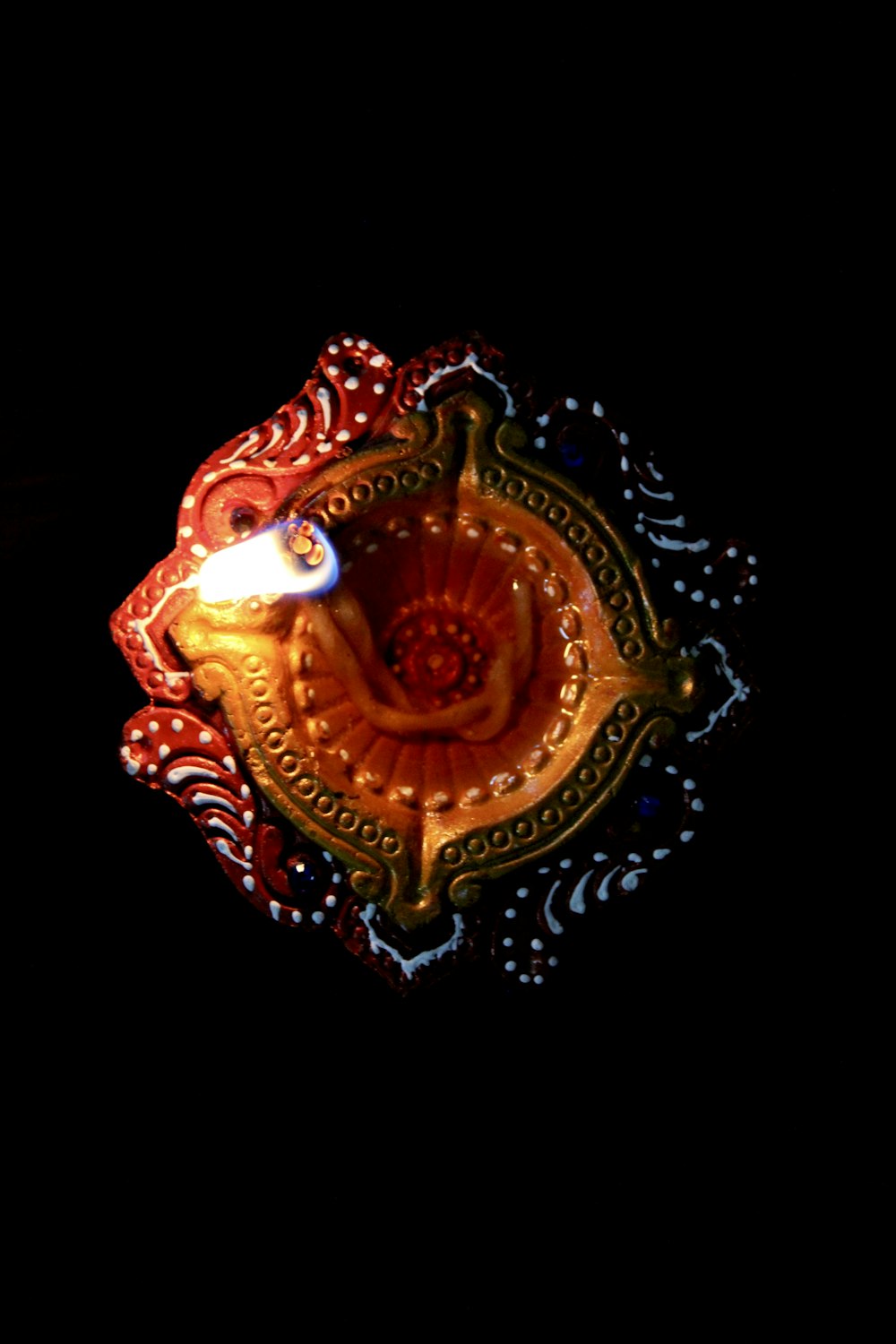 an overhead view of a carnival ride at night