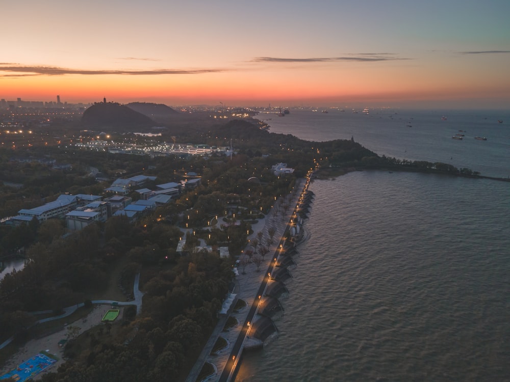 an aerial view of a city by the ocean