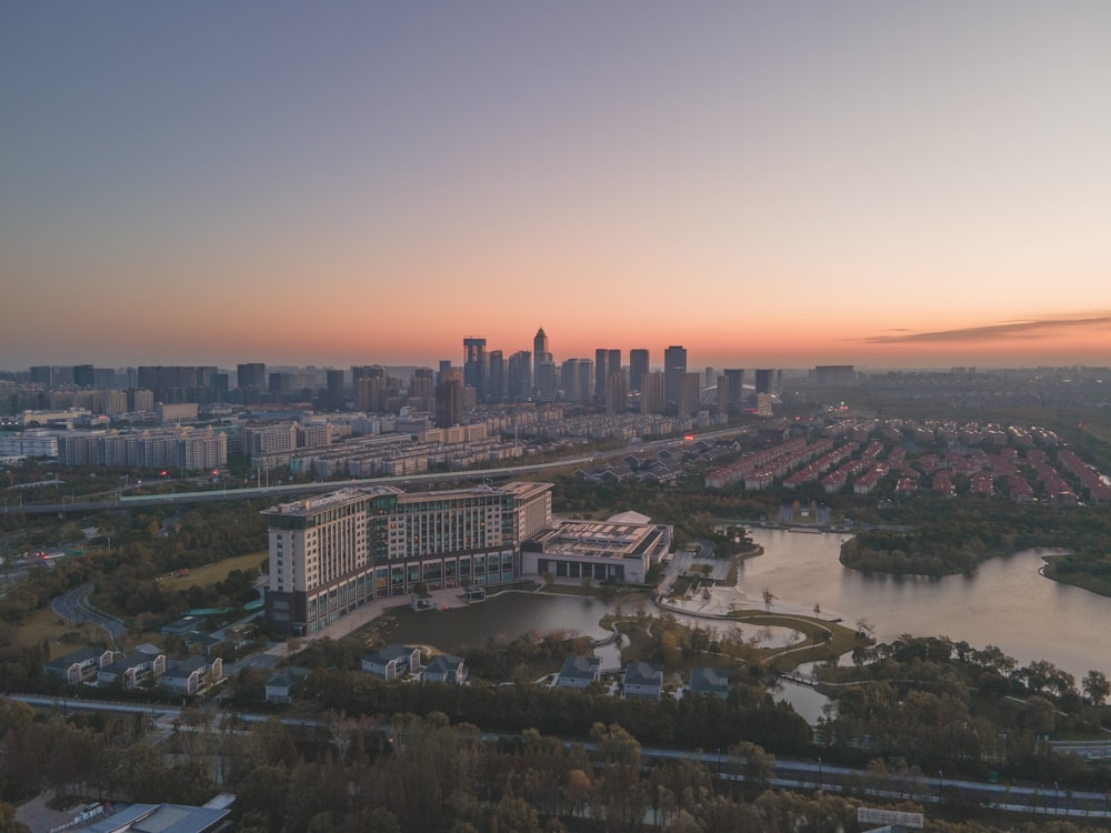 an aerial view of a city at sunset