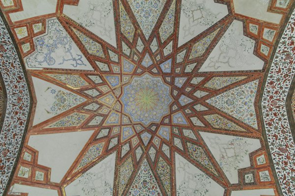 A painted and gilded ceiling at the Fin Garden — Kashan, Iran