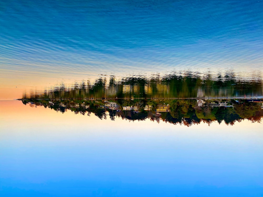 a lake with a small island in the middle of it