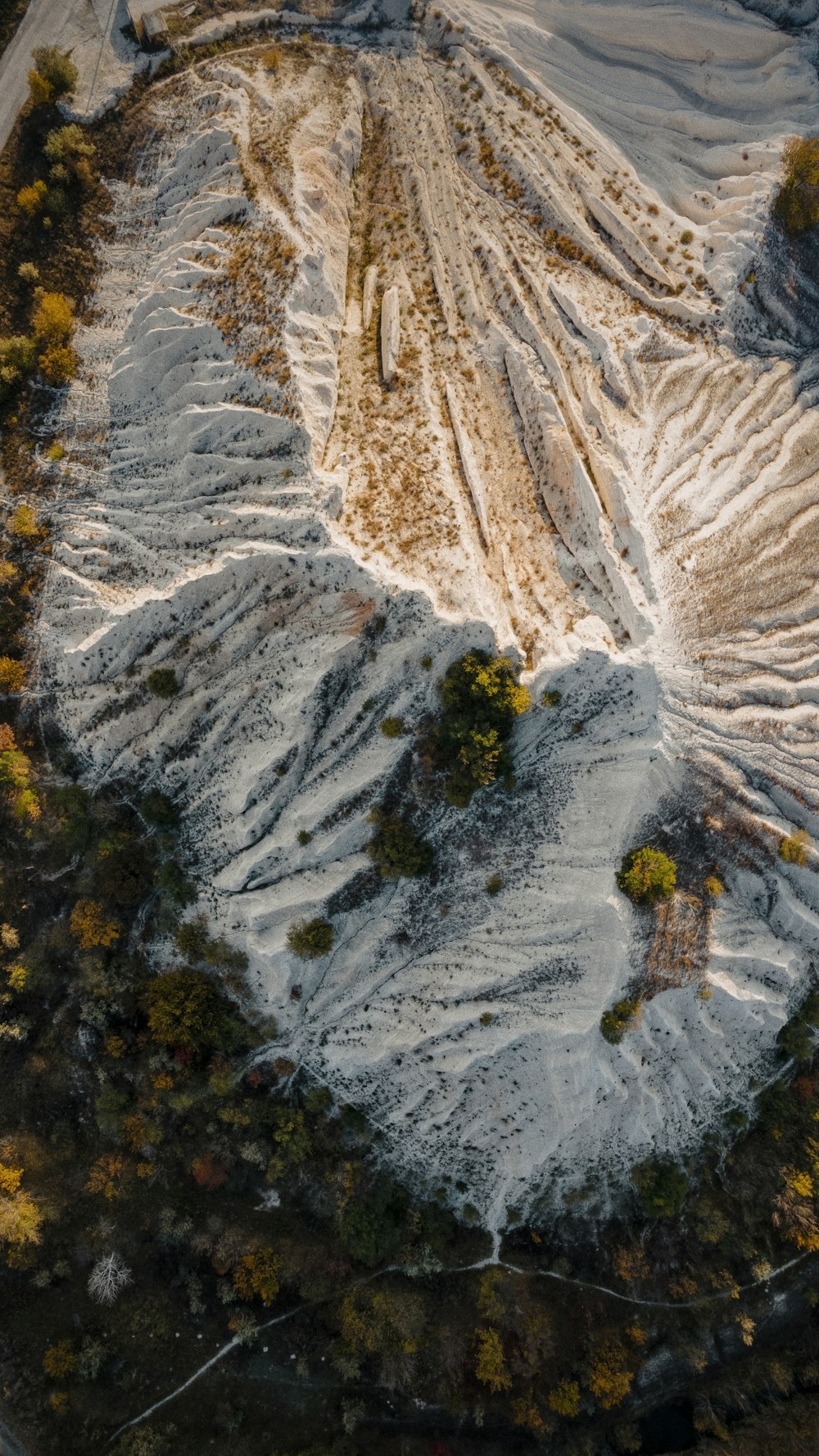 an aerial view of a snow covered mountain