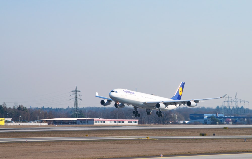 a large jetliner taking off from an airport runway