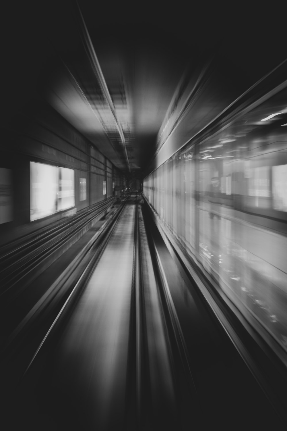 a black and white photo of a subway